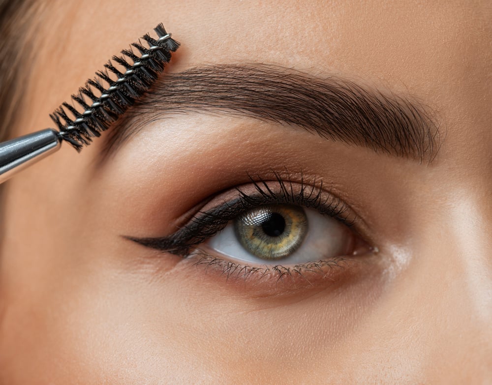 Long-lasting styling of the eyebrows and color the eyebrows. Eyebrow lamination. Professional make-up and face care.